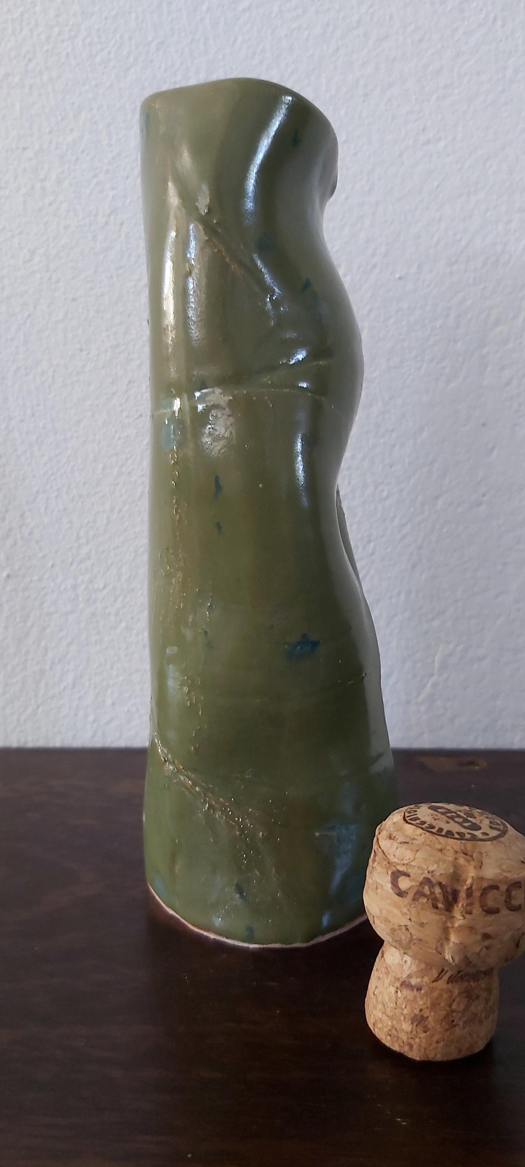 Earthenware green dribble glaze vase