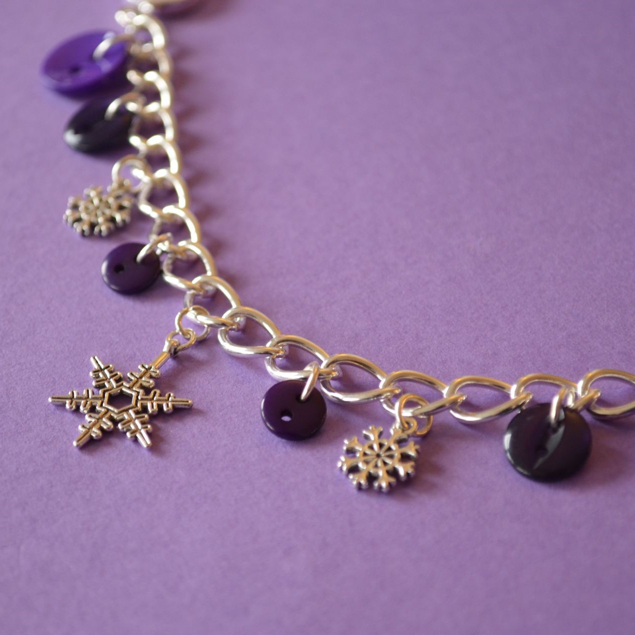 Dark Purple Snowflake Button Charm Bracelet