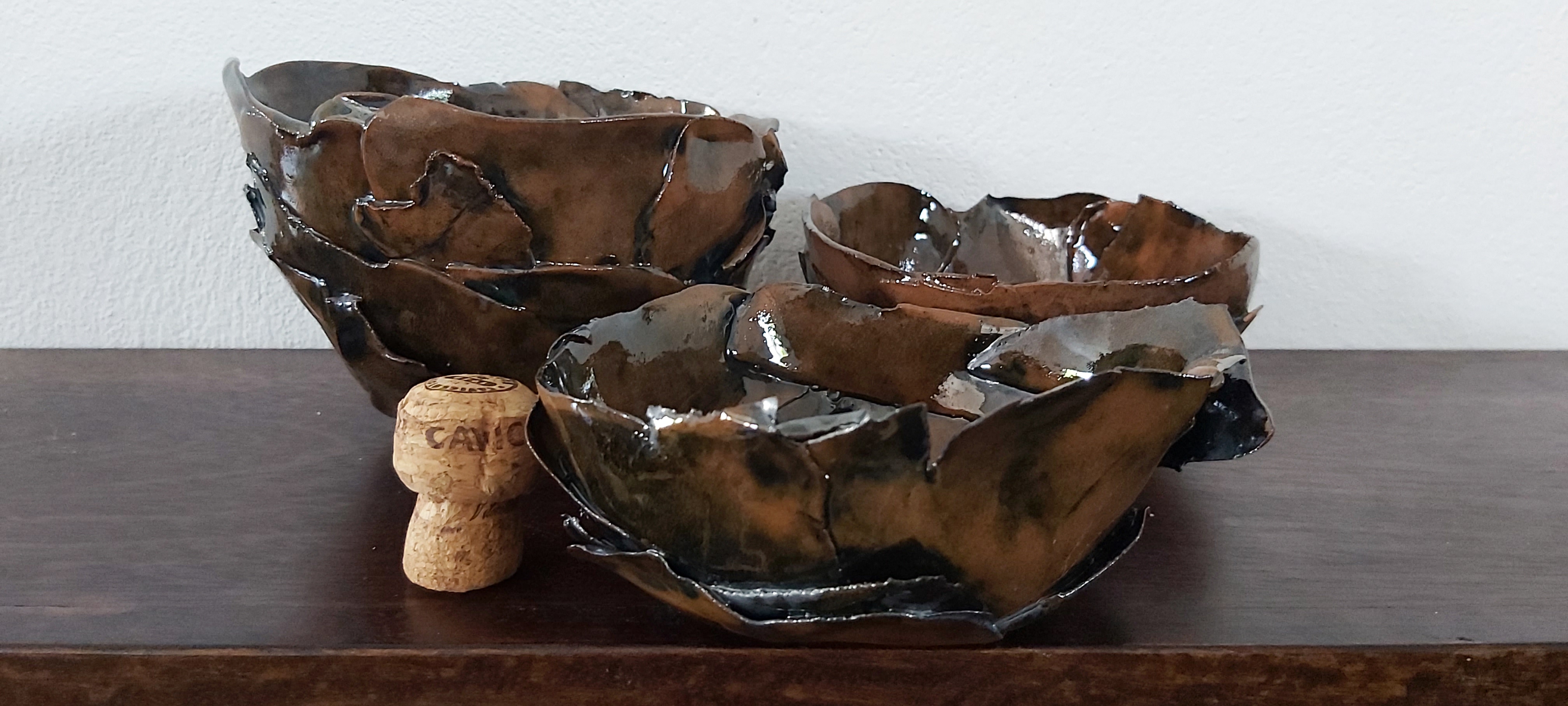 Set of three terracotta bowls