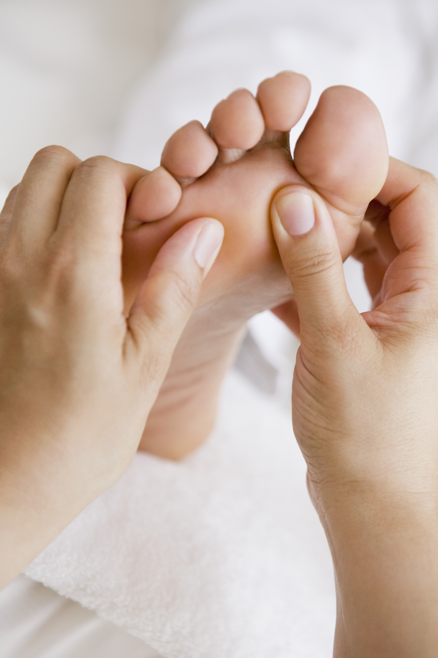 close-up-of-woman-receiving-foot-massagejpg