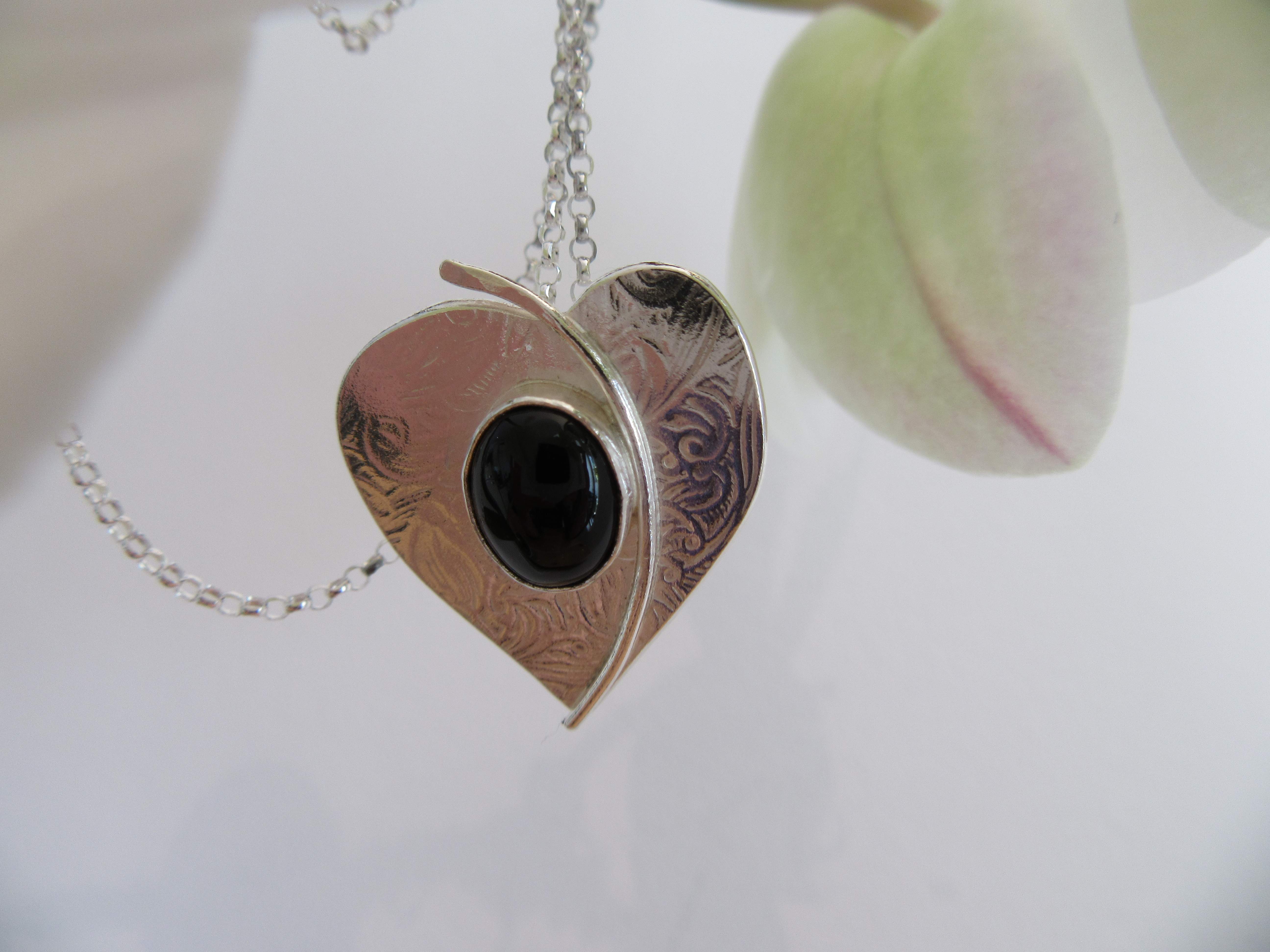 Silver heart with black onyx stone