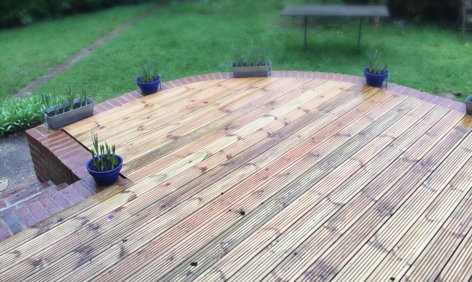 Creation of a decking area with brick perimeter