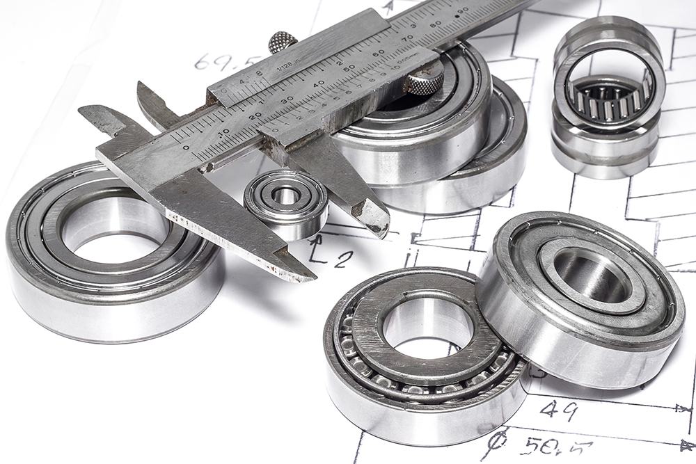 Assortment of bearings with vernier callipers