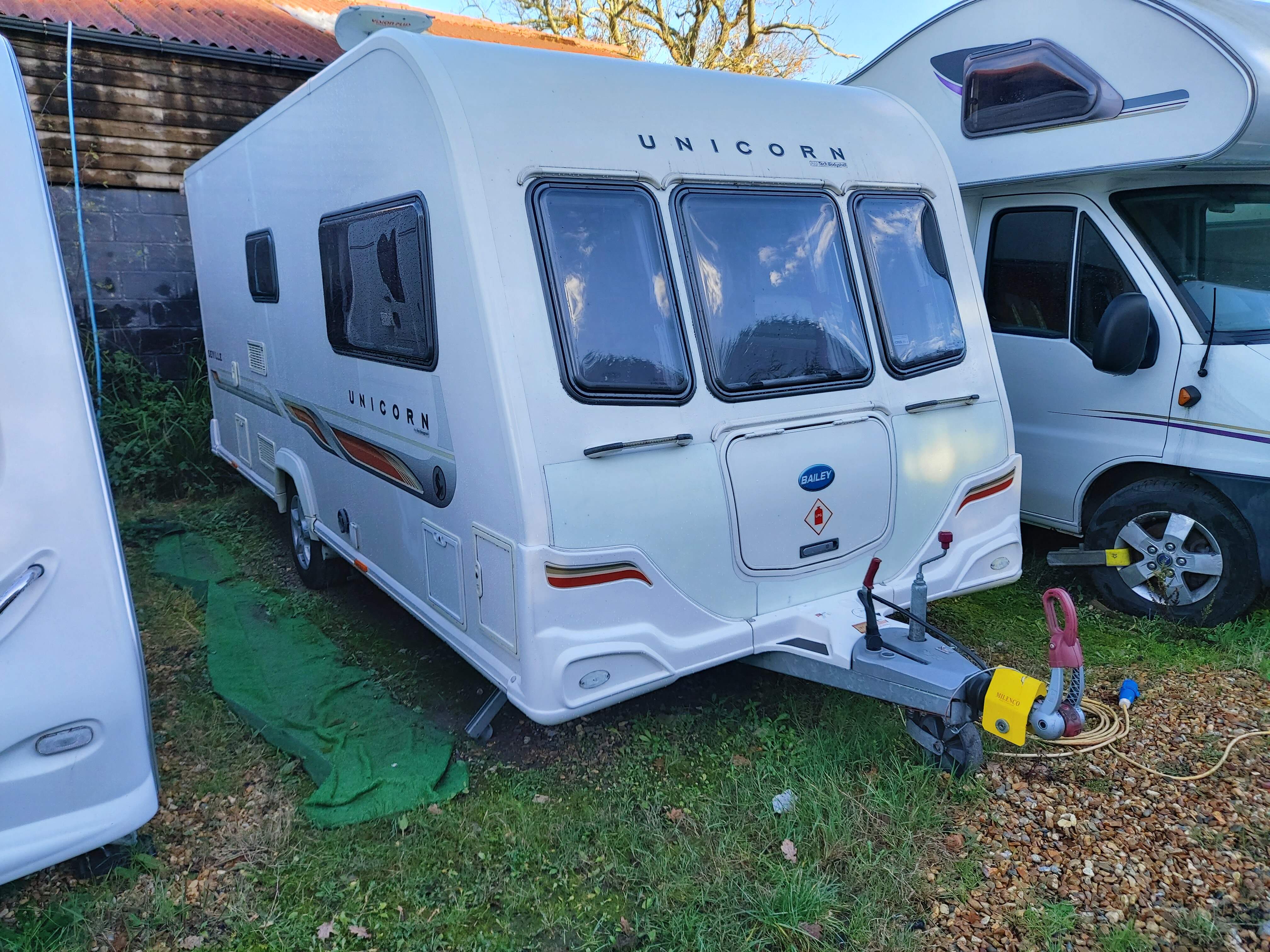 NOW SOLD 2011 Bailey Unicorn Seville 2 Berth End Washroom Caravan with Motor Mover,