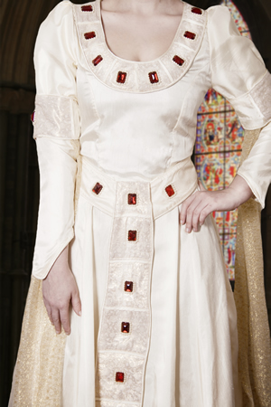 Cream Medieval gown with large red stones and beading