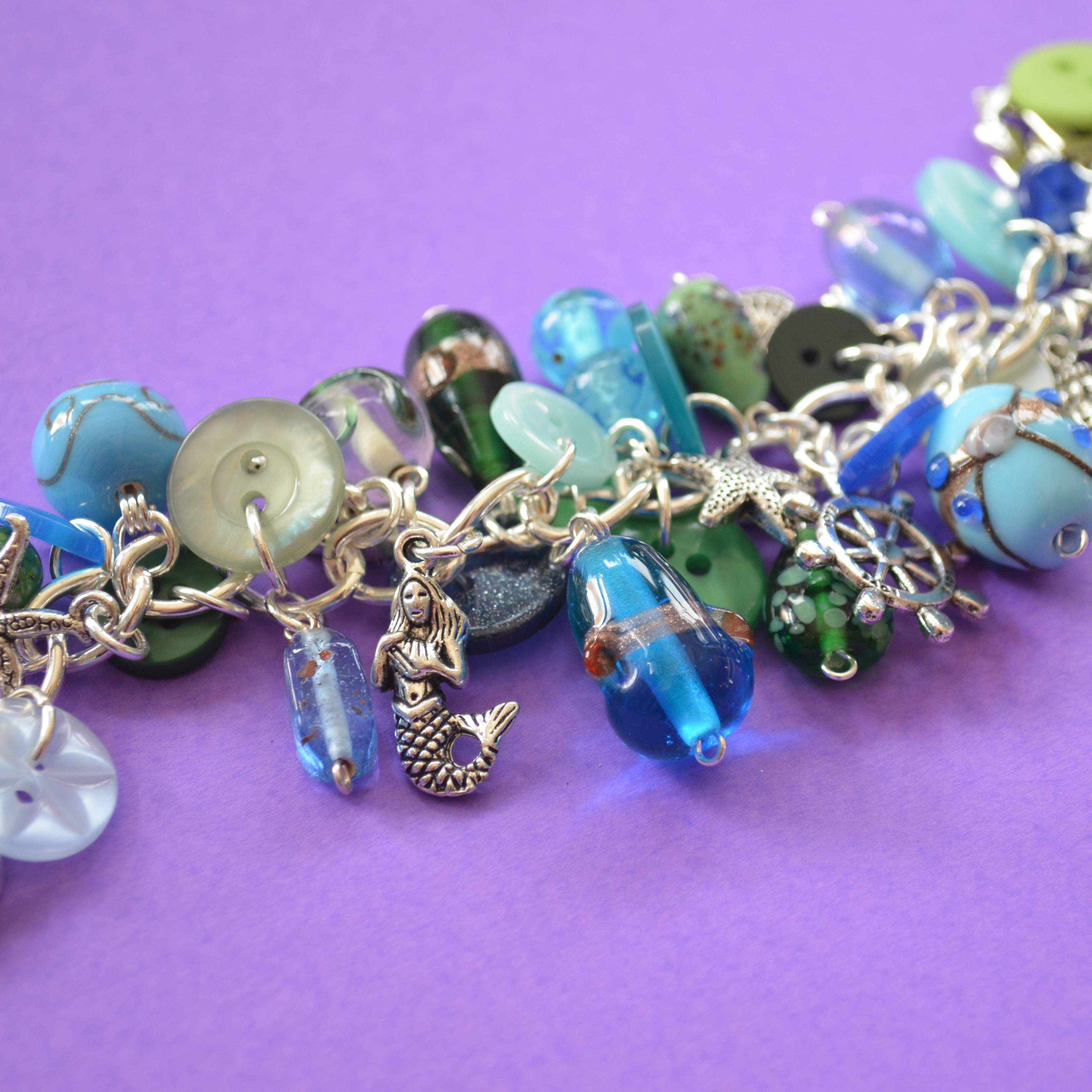 Button, Bead & Mermaid Charm Bracelet