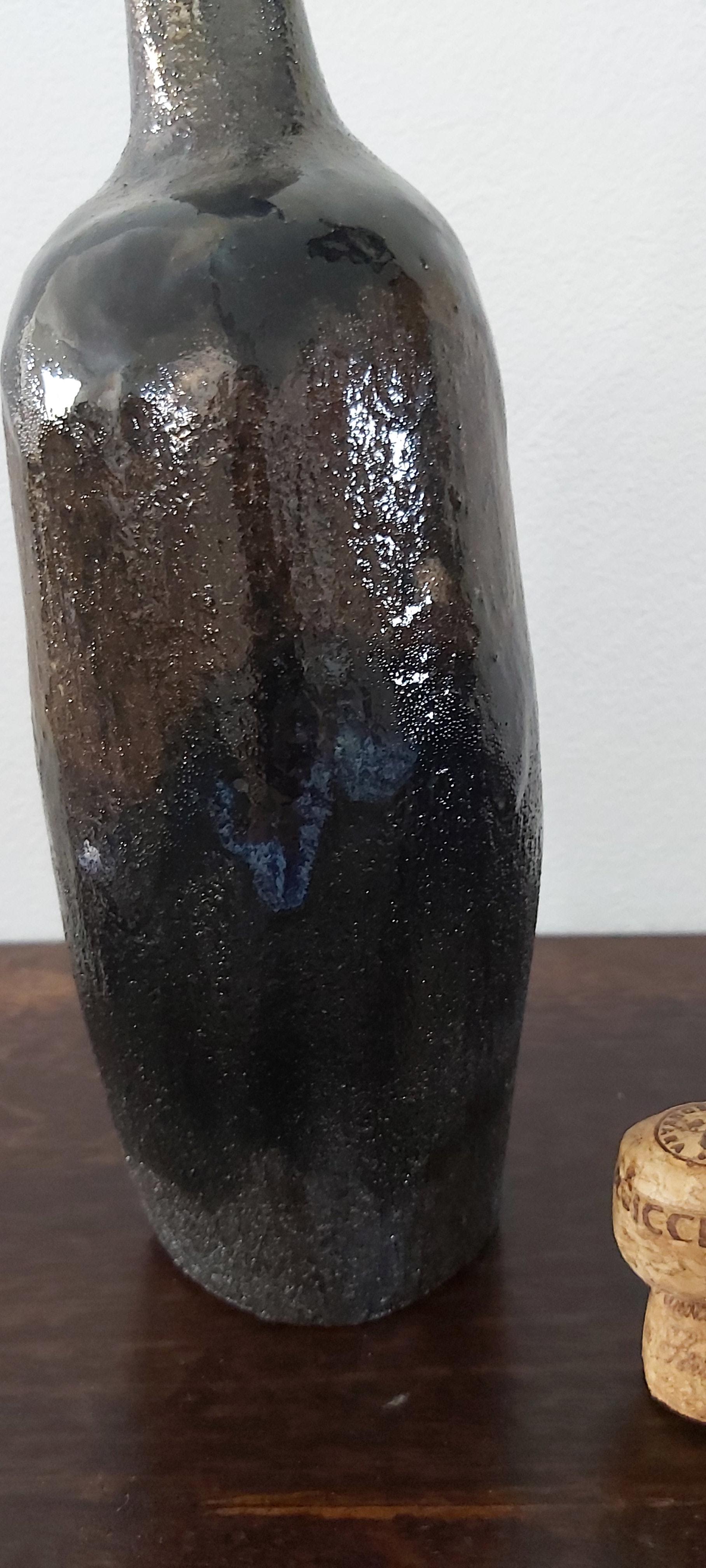 Chocolate brown clay bottle