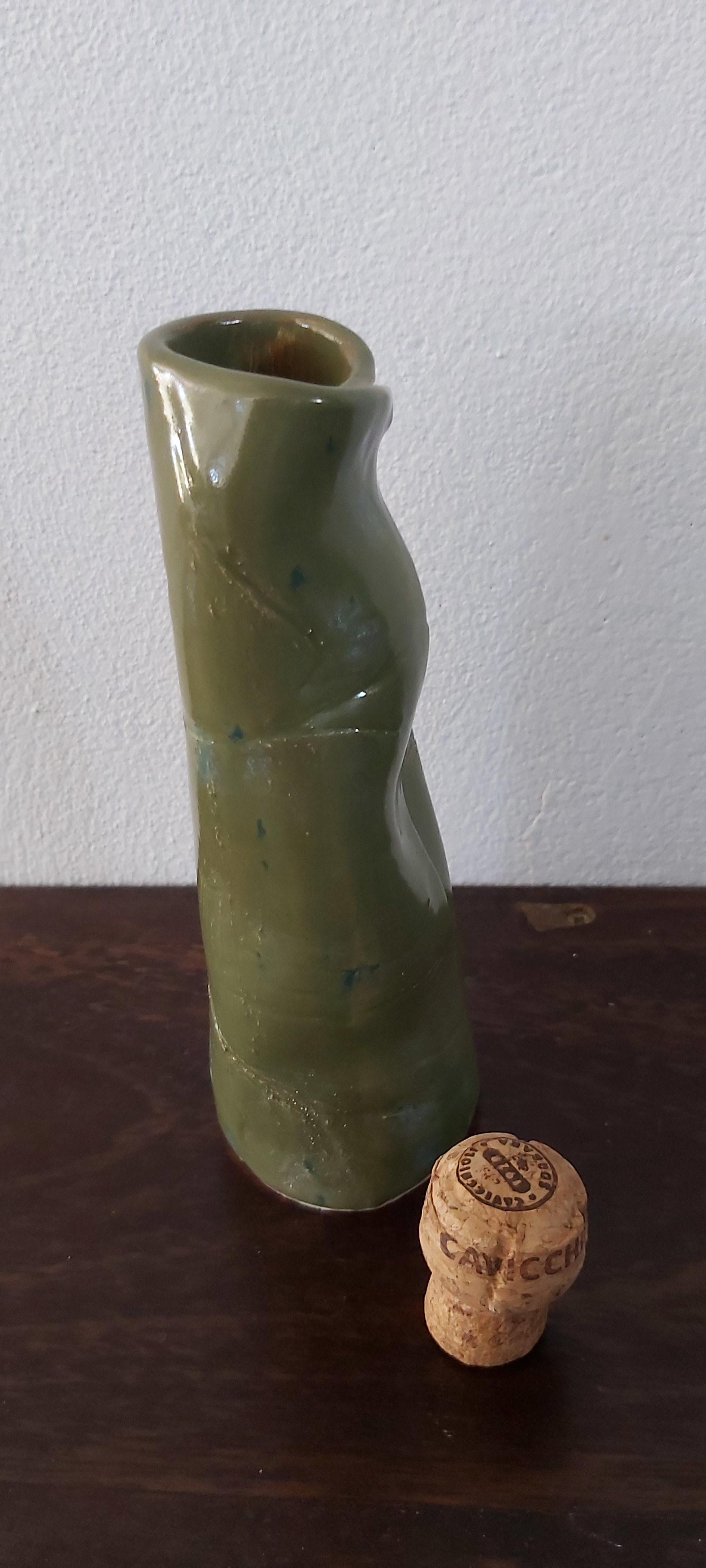 Earthenware green dribble glaze vase