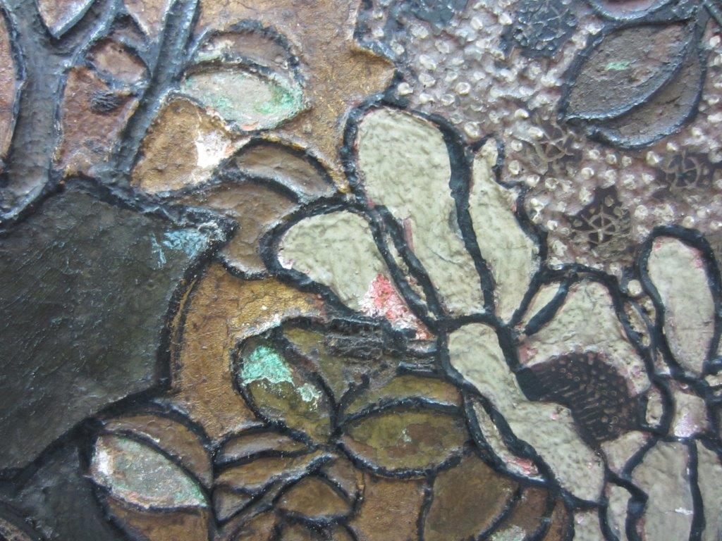 Detail of floral decoration showing small test areas of previous colour schemes