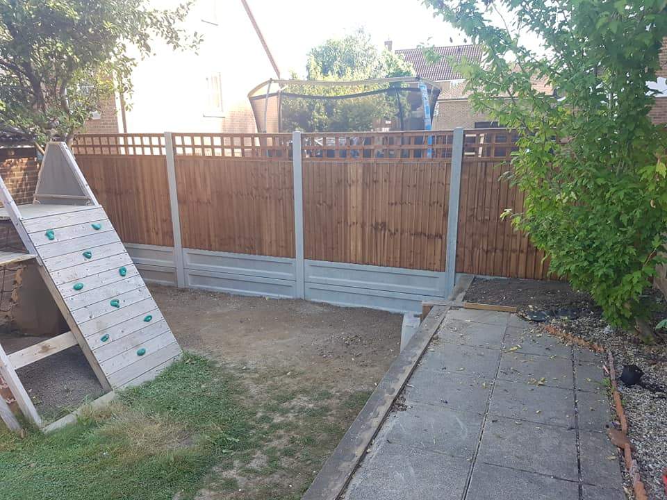 with trellis and concrete gravelboards, fencing installed in Wainscott