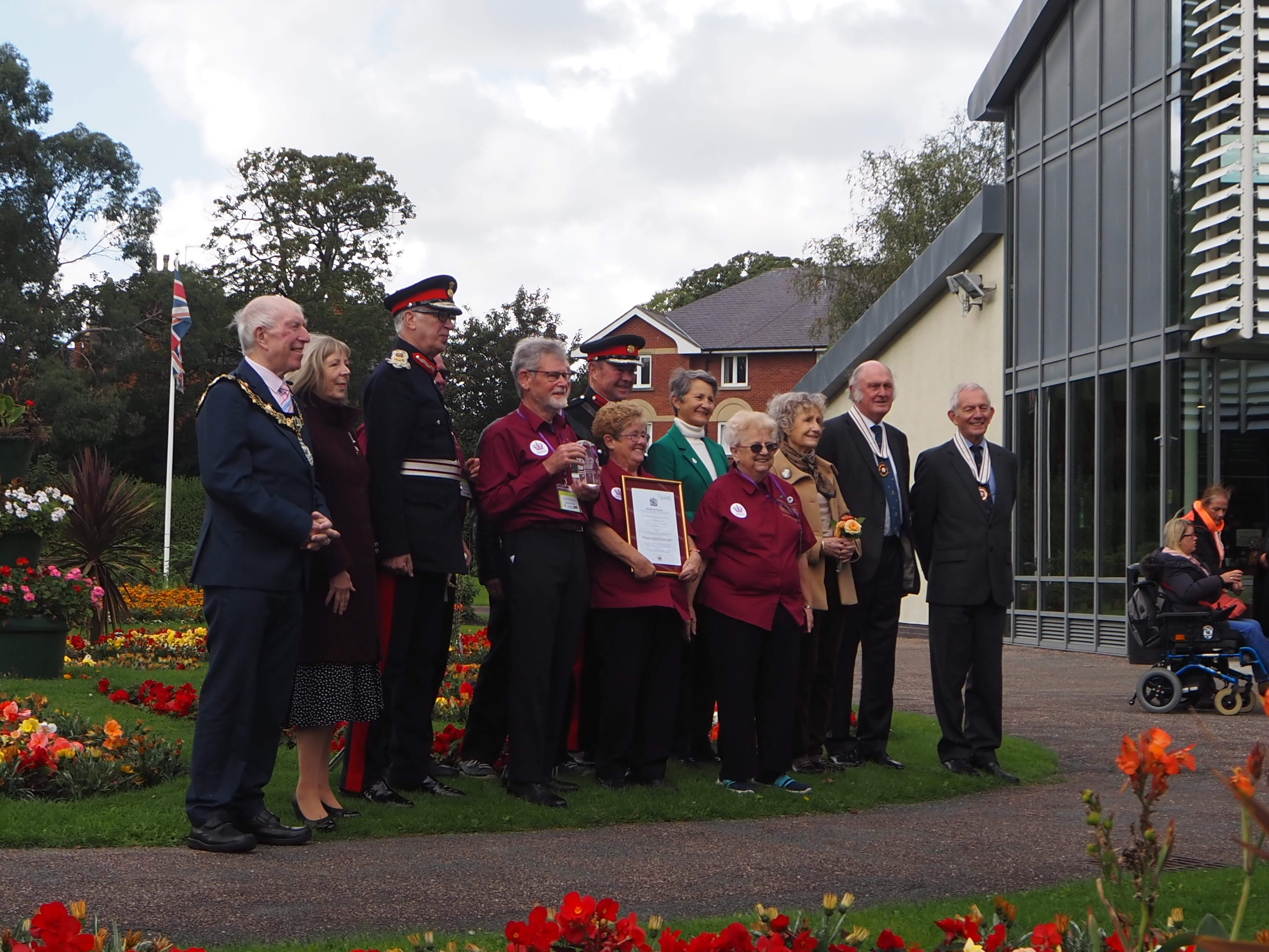 The Lord-Lieutenant of Merseyside presents the Queen’s Award for Voluntary Service  to the Friends of Birkenhead Park