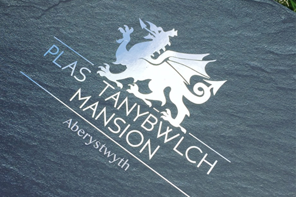 Plas Tanybwlch Mansion in Aberystwyth Silver Foiled Logo Design.