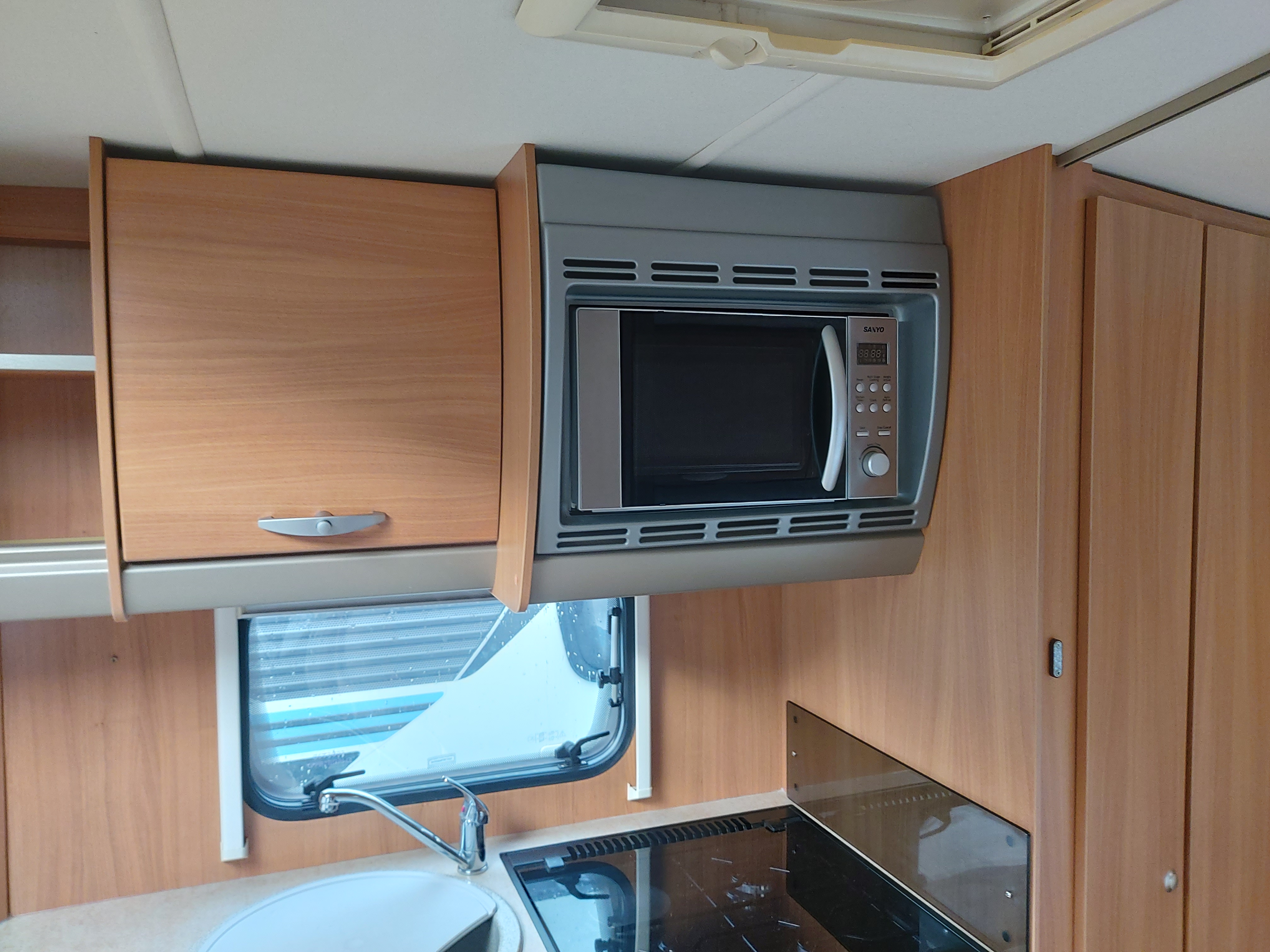 2010 Swift Corniche 19-4  4 Berth Fixed Bed End Washroom Caravan, Motor Mover