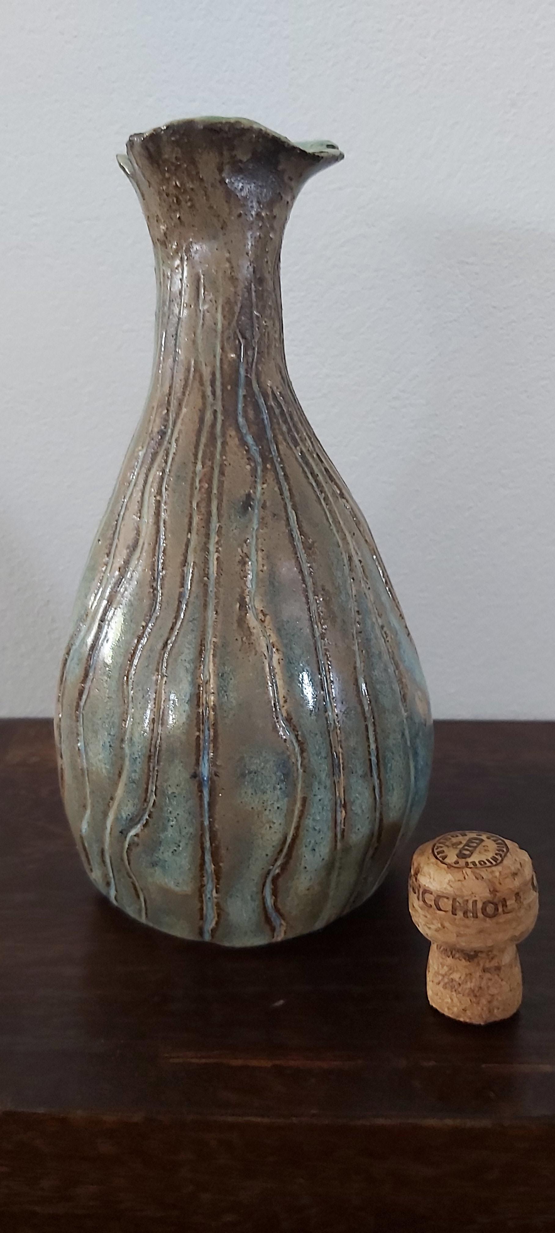 Bottle shaped vase