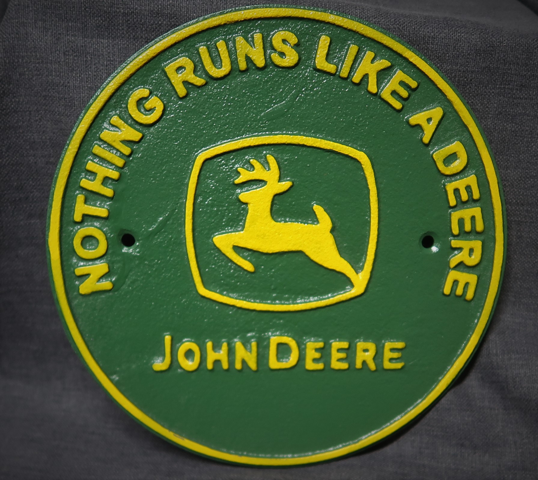 Cast iron John Derre sign