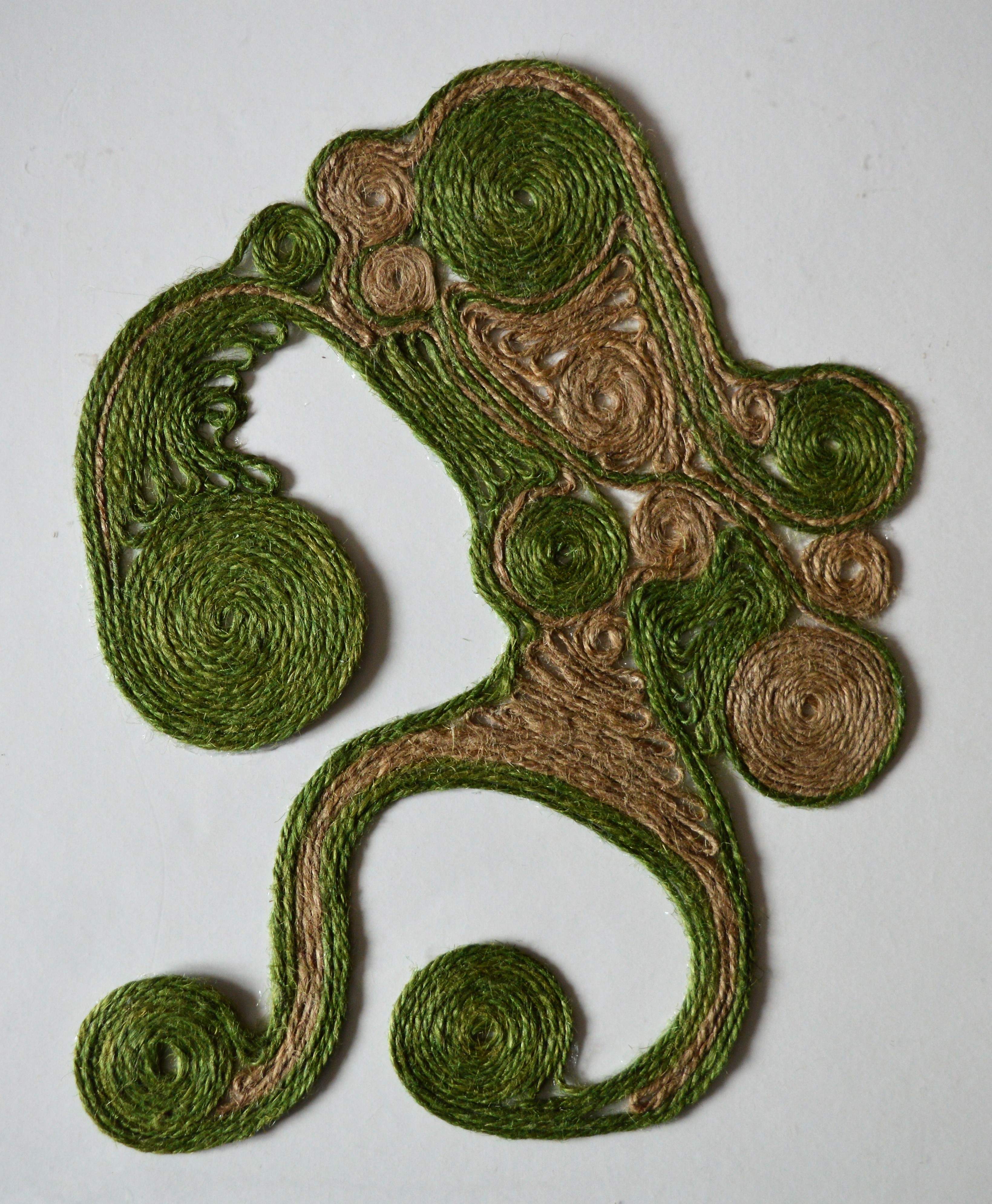 Green & brown twine, glue. Approx 23cm x 30cm.