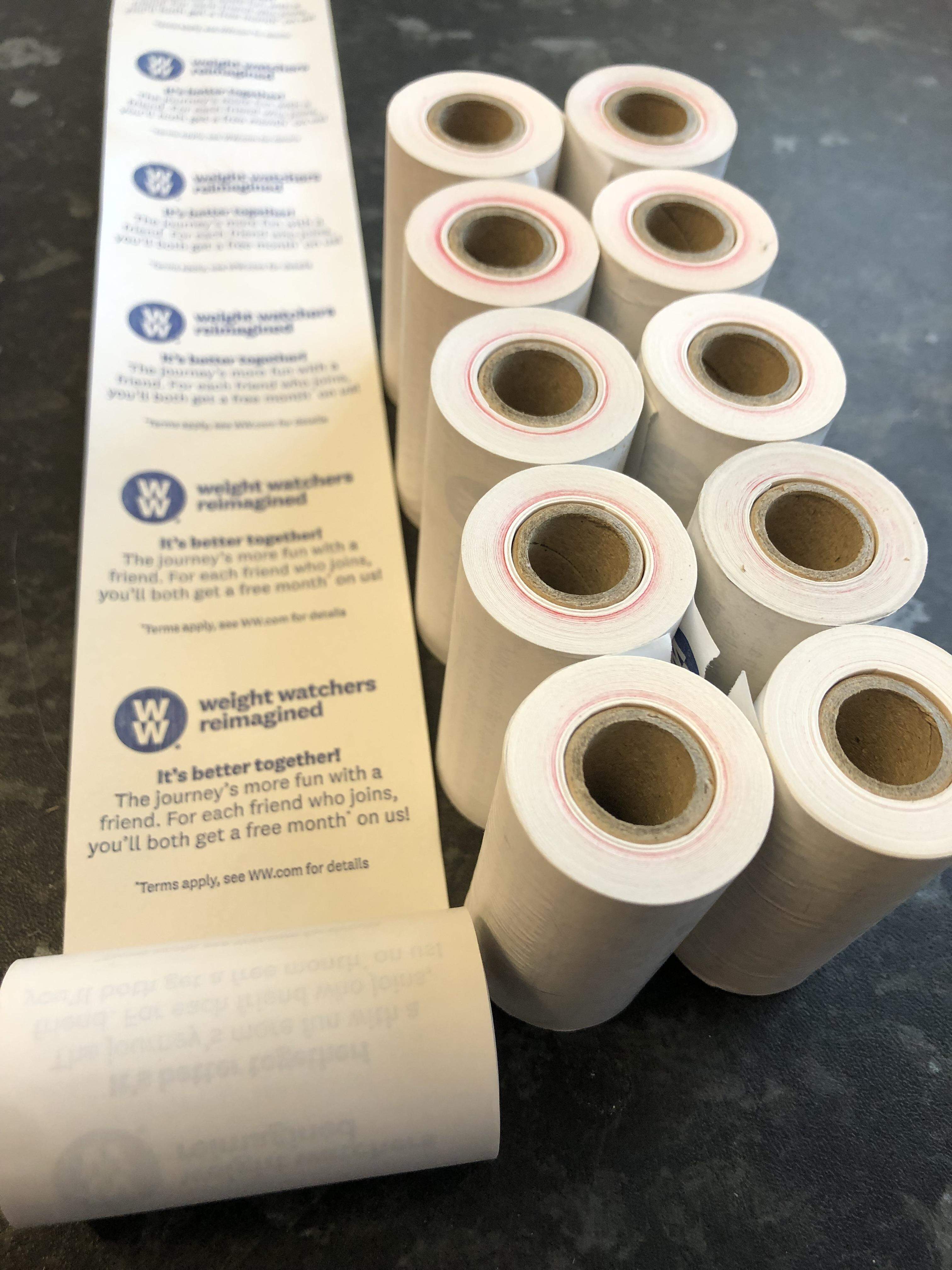receipt rolls that have been printed on the reverse with a weigh watchers advert