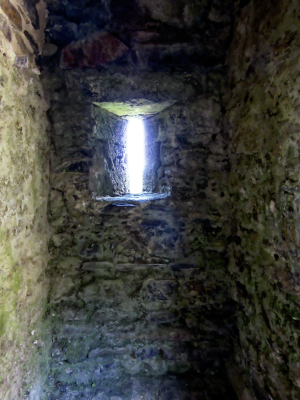 Image showing an arrowslit in the medieval Lydford Gaol wall, Lydford, Devon