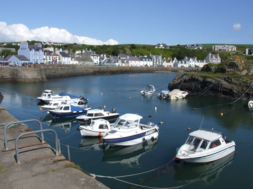 Portpatrick Harbour and a view of the pastel coloured houses that line the seafront