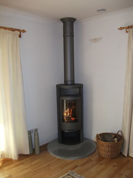 modern wood burning stove by Fireplaces Direct of Springholm, Castle Douglas