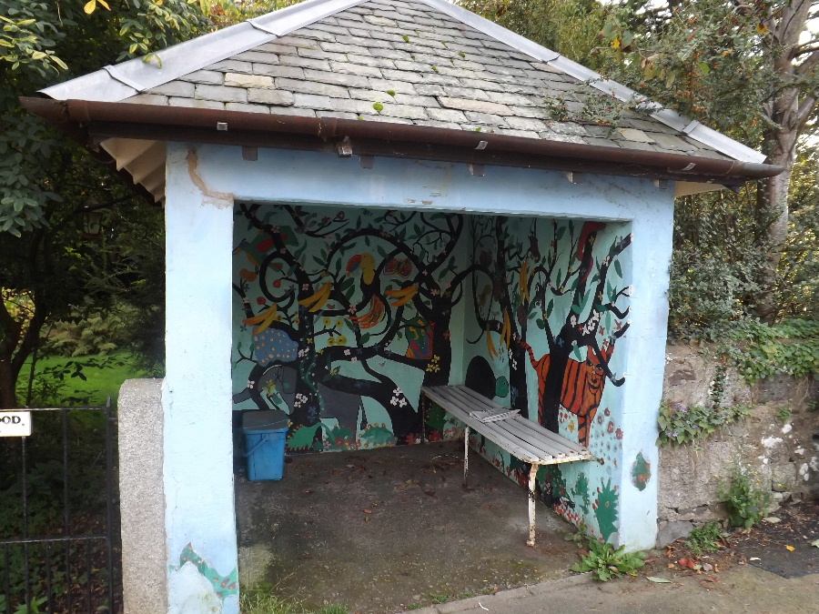 A bus shelter with a mural painted by local children at Kirkbean, Dumfries and Galloway