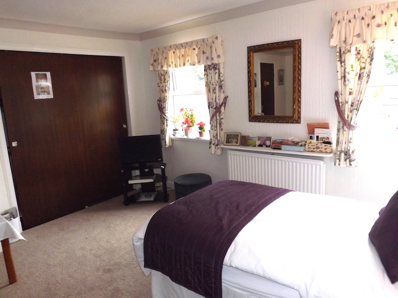 Wide doors from the bedroom into the ensuite facilities