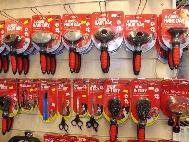 Range of dog grooming brushes and scissors