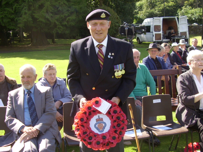 Tommy Lane, Poppy Convenor of the Moffat Branch of the Royal British Legion, seen here with a wreath