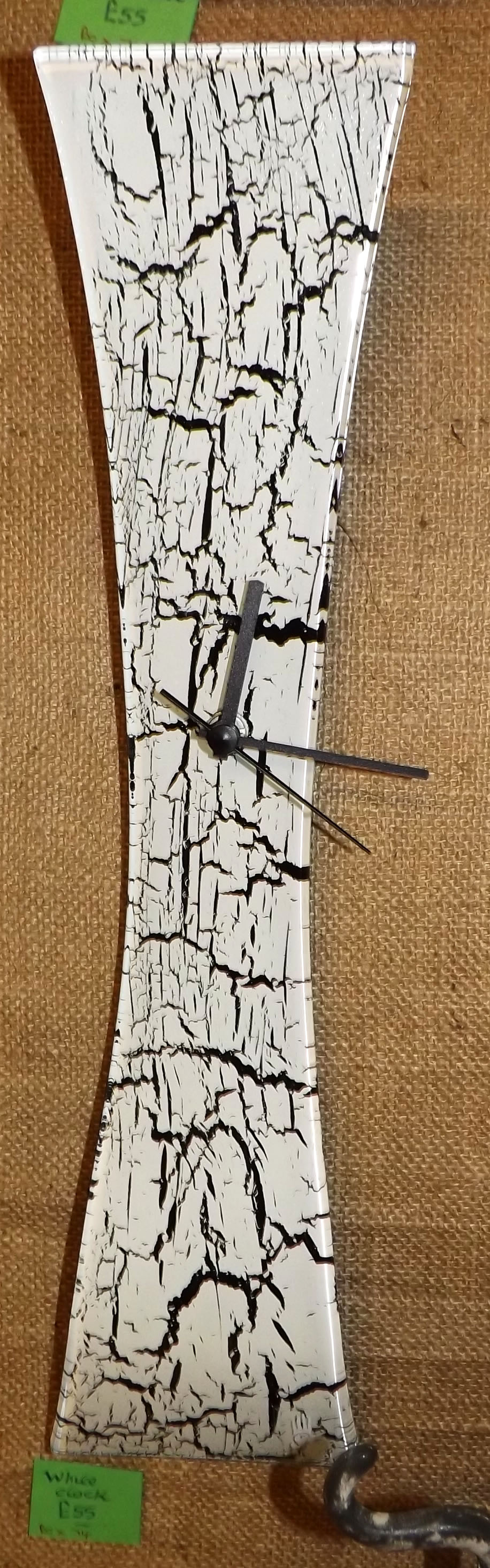 White clock with black crackles