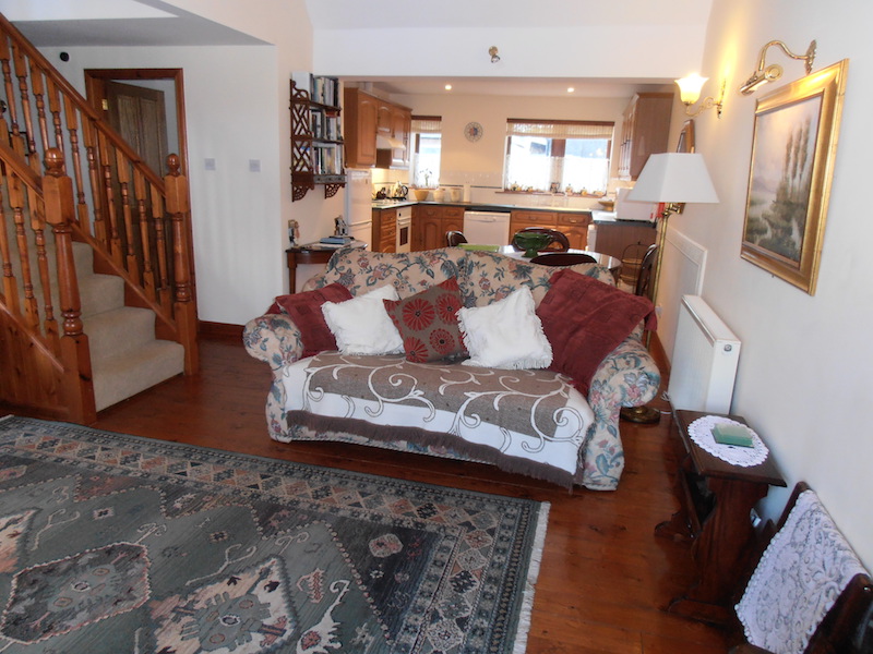The open plan lounge and kitchen of The Dairy House holiday accommodation in Kirkcudbright