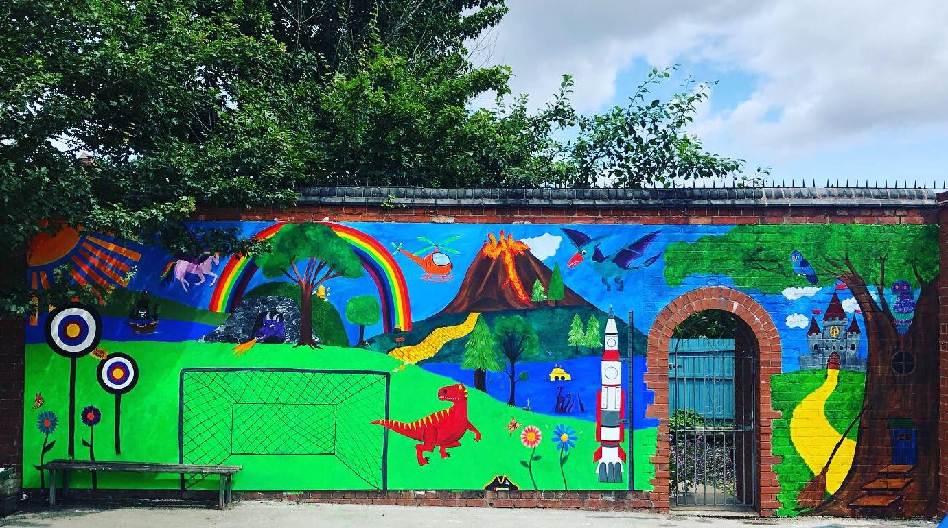 Story time mural painted with acrylics on an outside wall at Harborne Primary School Birmingham